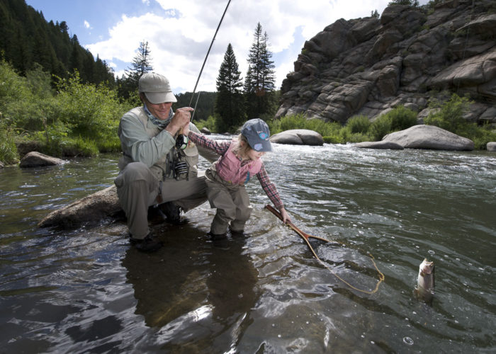 Fly fishing in 11-Mile Canyon near Lake George, Colorado.