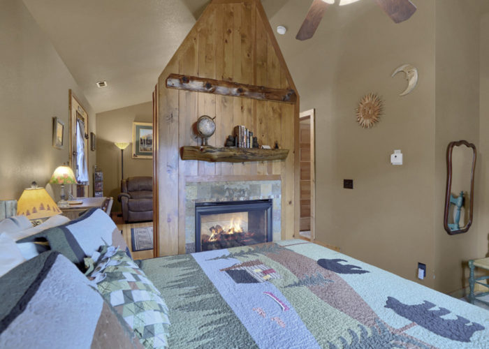 rocky-mtn-lodge-Suite-Bedroom-Fireplace-2